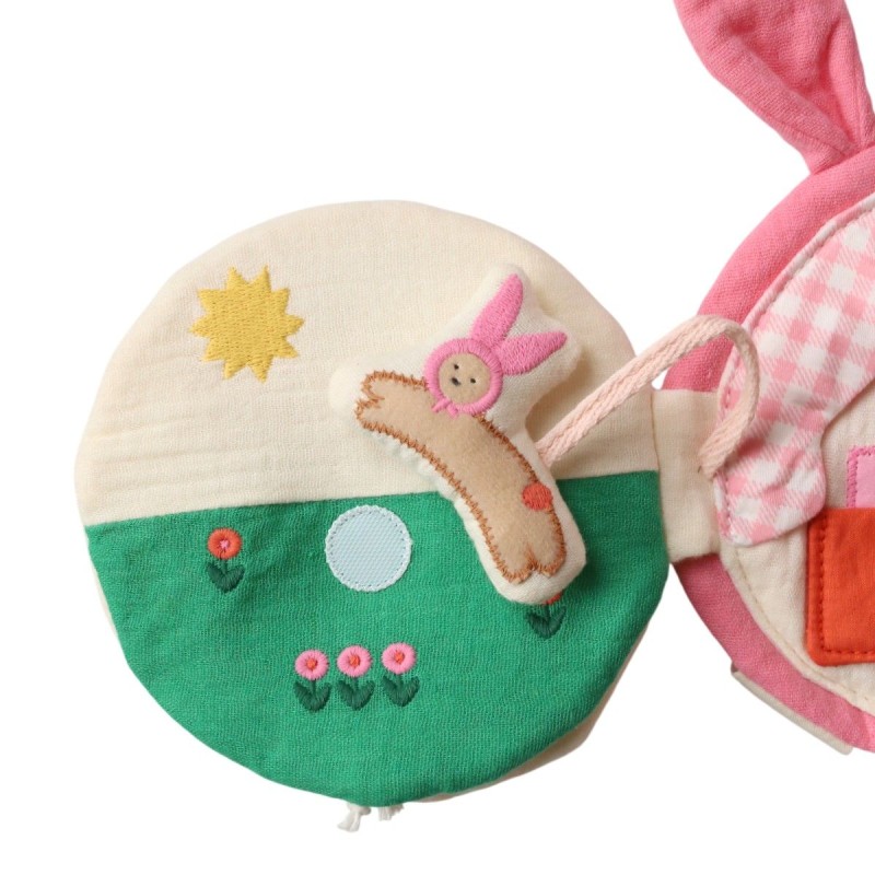 Livre d'éveil lapin rose